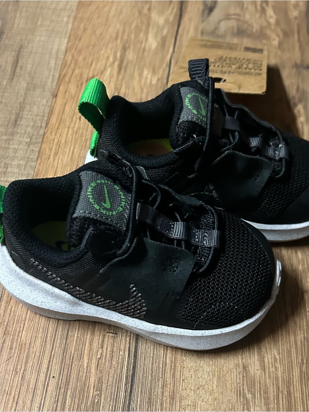 Nike Kids Black Sneakers with Green Accents